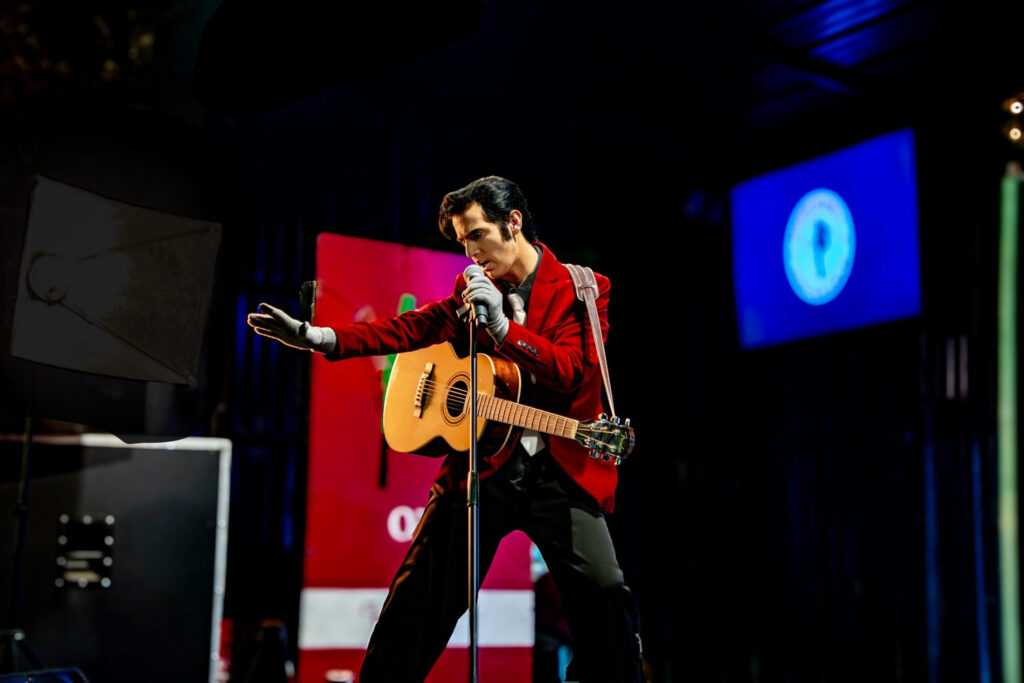 Hunter Cole on stage impersonating Elvis Presley